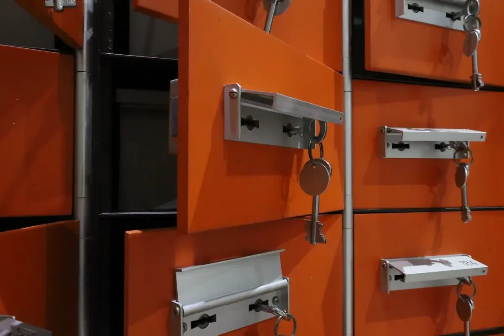 Orange lockers with keys and locks, commercial locksmith