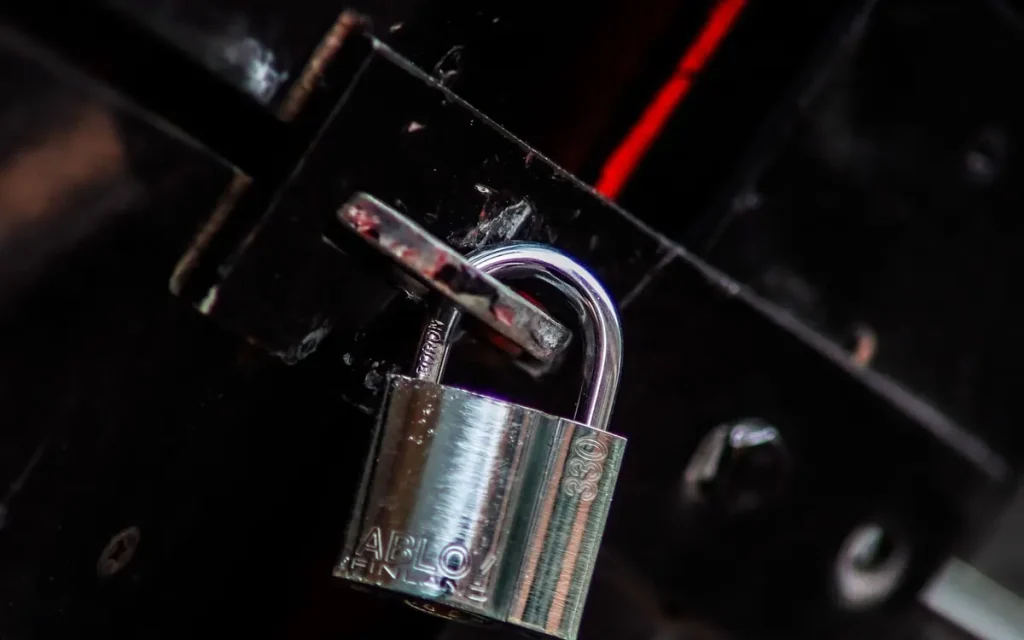 Padlock on a dark metal surface, lock service in Highland City, FL