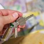 Hands handing over keys, key copies in Lakeland