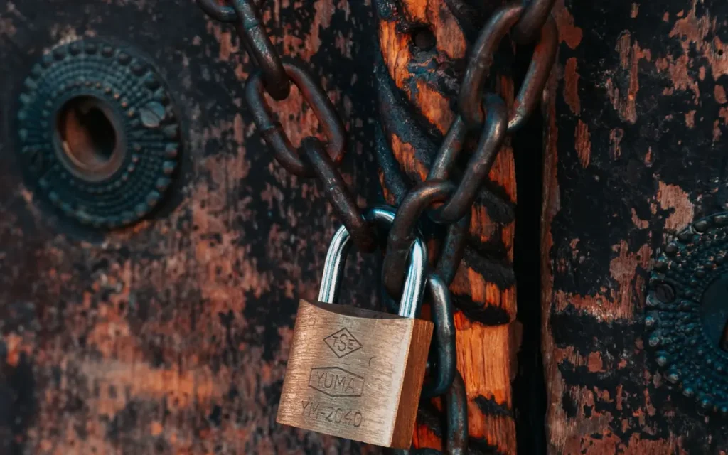Chain and padlock on a rusty door, lock service in Plant City, FL