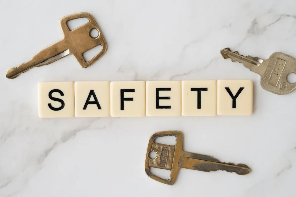 Keys beside the word safety on marble