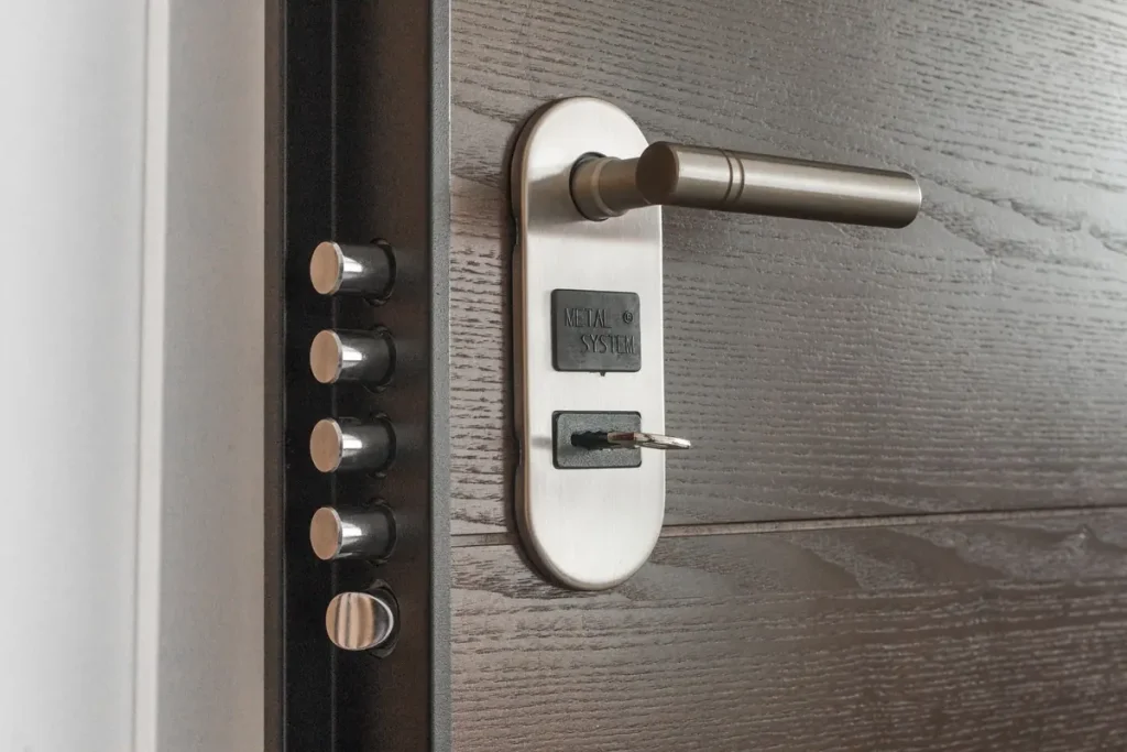 Smart door handle lock with a keypad on a dark door