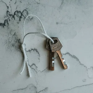 Two keys on a cord, locksmith key copies